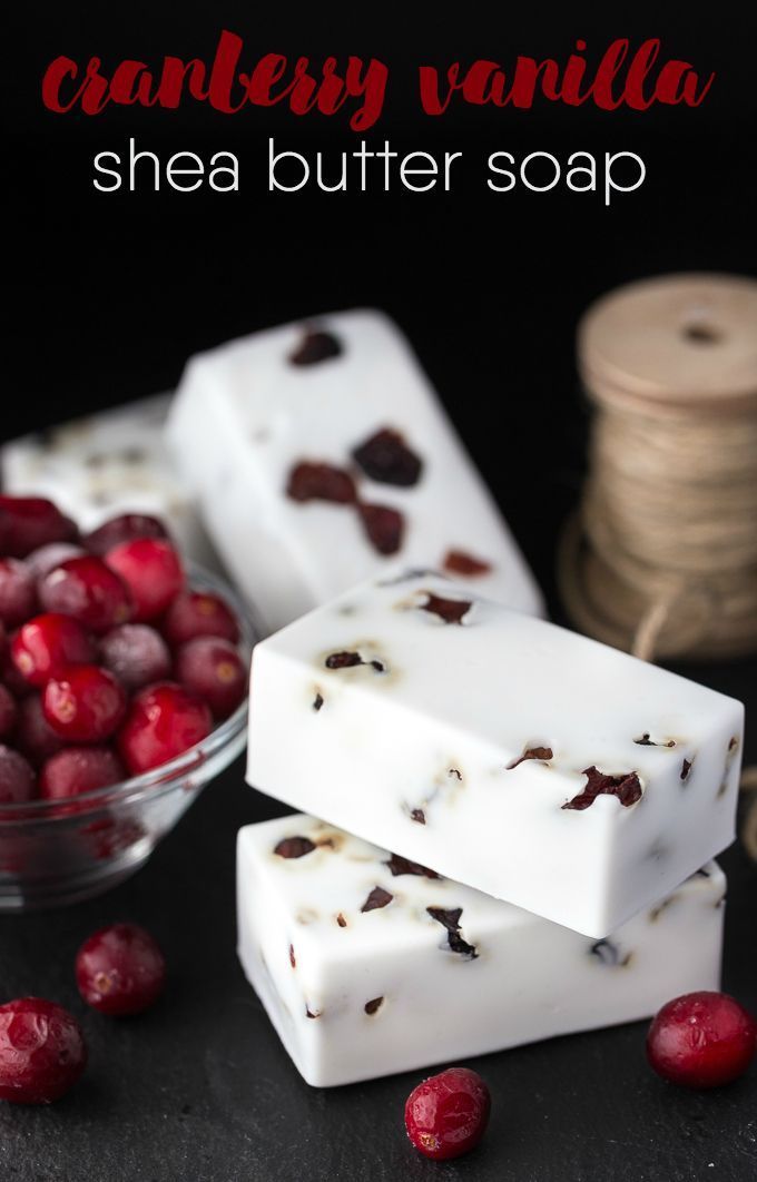 cranberry vanilla shea butter soap is shown in front of some cranberries