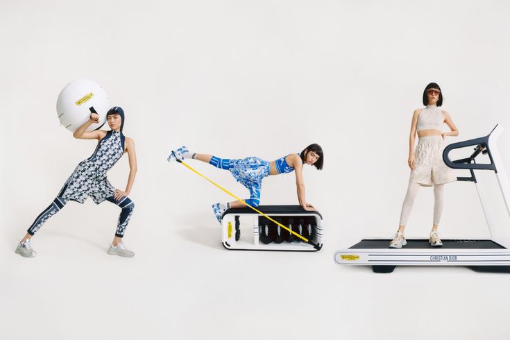 three women are doing exercises on treadmills and exercise machines, one is holding a ball