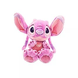 a pink stuffed animal with big ears