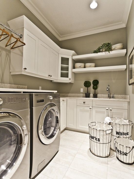 a washer and dryer in a small room