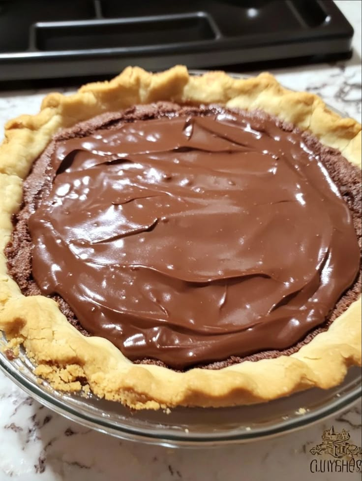 a chocolate pie sitting on top of a counter