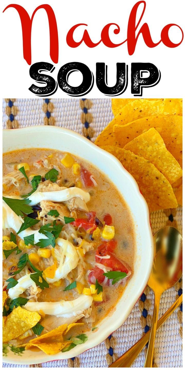 a white bowl filled with chicken tortilla soup next to a spoon and chips