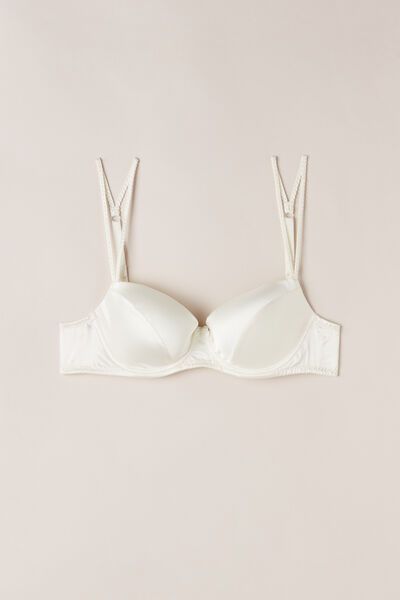 Embrace your beauty

The snug underwire and padded cups provide optimal support, while adjustable double braided straps add an elegant touch. Designed to enhance your décolleté with a sensual and refined silhouette, it's time to embrace the allure of silk and shine with confidence. Elegant Strappy Top With Built-in Bra, Classic Underwire Bra With Adjustable Straps, Classic Padded Bra, Classic Padded Push-up Bra, Elegant Push-up Bra With Adjustable Straps, Chic Evening Bra With Adjustable Straps, Elegant White Underwire Bra, Feminine Padded Underwire Bra, Classic Push-up Bra With Adjustable Straps