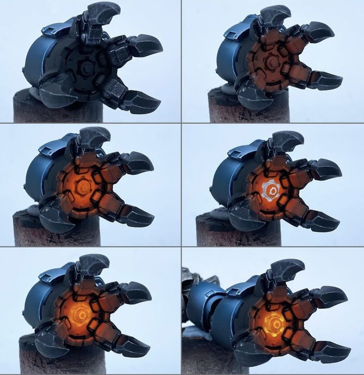 four different views of the inside of a robot suit with orange light coming from it