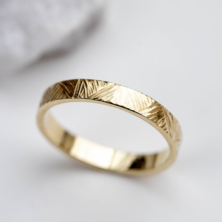 Unique Wedding Band 14K Gold Men Women - His and Hers Handcarved Wedding Ring Custom - Kyklos Jewelry A unique ring made of 14k solid gold with softened edges for comfort. Engrave the ring with no extra cost. High polished wedding band. 100% handcrafted with love! D E T A I L S ● Material: 14K solid gold, 14K white gold, 14K rose gold ● Finish: High polished ● Dimensions: 3.5mm width, 1.3 thickness R I N G ∙ S I Z I N G For General Reference: ● we use standard US Ring Sizing ● an average women's Gold Engraved Ring With Polished Finish For Wedding, Gold Engraved Wedding Ring With Polished Finish, 14k Gold Engraved Ring With Diamond Cut For Wedding, Minimalist Wedding Ring With Diamond Cut Engraving, Engraved Yellow Gold Wedding Ring, Minimalist Engraved Diamond Cut Ring For Wedding, Minimalist Engraved Wedding Ring With Diamond Cut, Gold Wedding Couple Rings Stamped 14k, 14k Gold Wedding Ring With Diamond Cut