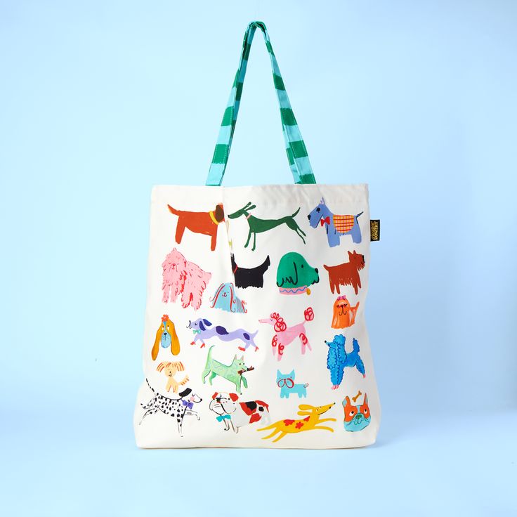 a white bag with colorful dogs on it