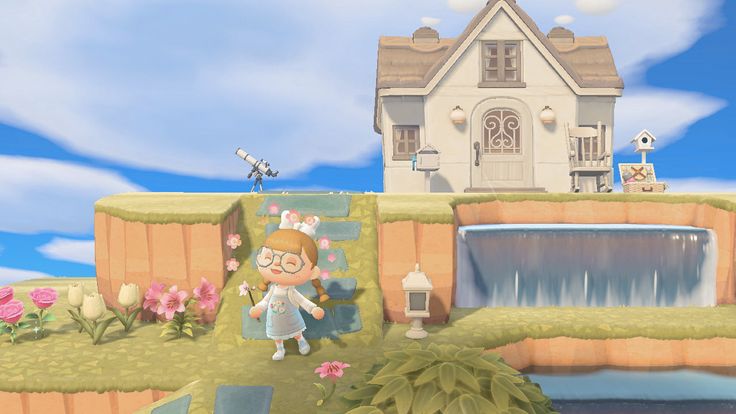 an animal crossing game with a house in the background and water running down it's side