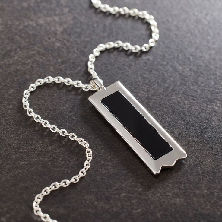 Find the Silver & Black Rectangle Pendant by Bead Landing™ at Michaels. Add eye-catching style to a handcrafted necklace with this pendant from Bead Landing. A black rectangle in a silver setting, this pendant will make a striking piece on its own or paired with complementary stones and charms on a simple chain. Add eye-catching style to a handcrafted necklace with this pendant from Bead Landing. A black rectangle in a silver setting, this pendant will make a striking piece on its own or paired Modern Black Necklaces For Everyday Use, Modern Black Necklace For Everyday Use, Modern Black Necklace For Everyday, Modern Black Necklace With Large Pendant, Black Pendant Necklace For Everyday Use, Elegant Rectangular Necklace For Everyday Use, Modern Black Necklace With Square Pendant, Black Minimalist Rectangular Pendant Jewelry, Black Rectangular Pendant Necklace For Everyday