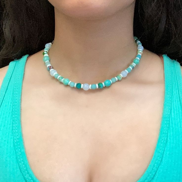 This Is A Handmade Aqua Blue And Green Necklace. This Is Made Out Of Various Shades Of Blue/Green. This Is On A Necklace Wire Accompanied By A Clasp. The Measurement For This Necklace Is 15 Inches, But Message Me For Any Size Customizations. #Beach #Necklace #Handmade #Beadednecklace #Beads Casual Turquoise Beaded Necklaces With Colorful Beads, Casual Turquoise Beaded Necklace With Colorful Beads, Casual Turquoise Beaded Necklaces, Casual Turquoise Beaded Necklace, Casual Blue Necklace With Colorful Beads, Casual Blue Beaded Chain Necklace, Casual Blue Beaded Chain, Trendy Turquoise Beaded Necklaces With Round Beads, Trendy Turquoise Round Beaded Necklace