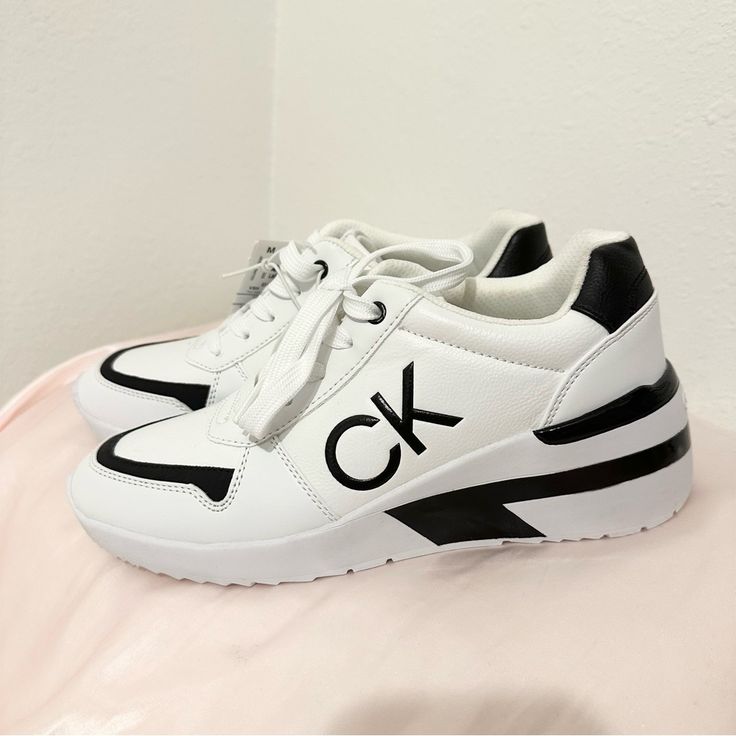 Brand: Calvin Klein Condition: Nwt Size: 8.5 Calvin Klein Sporty Sneakers With Contrast Sole, Calvin Klein High-top Leather Sneakers, Modern Calvin Klein Sneakers With Round Toe, Calvin Klein Modern Sneakers With Round Toe, Calvin Klein Sneakers With Contrast Sole, Calvin Klein Sporty Low-top Sneakers, Calvin Klein Low-top Sneakers With Contrast Sole, Calvin Klein Low-top Sneakers For Streetwear, Calvin Klein Sporty Sneakers With Round Toe