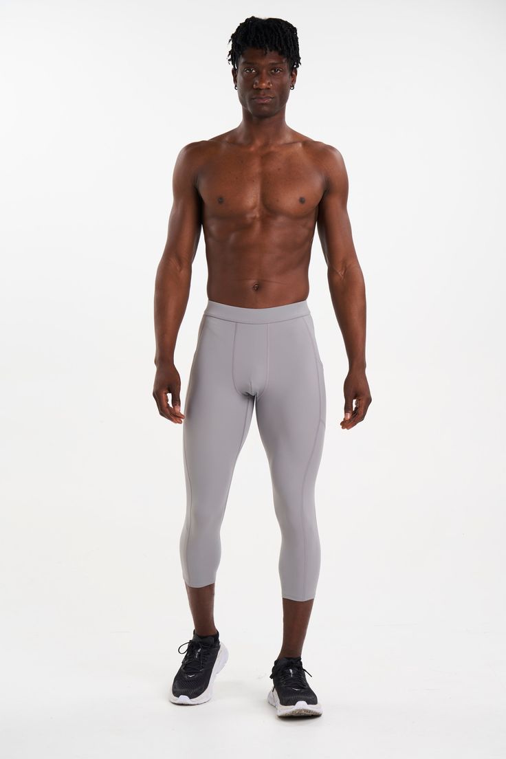 Looking for men's running tights that finally offer both comfort and performance? Our ALSPRT running tights are designed to give maximum flexibility and support, so you can focus on your run. Wear under your run shorts or on their own. The breathable, moisture-wicking premium fabric made from recycled fishing nets, keeps you comfortable and cool with a non-restricting, supportive fit. Run your best in our high-performance running tights. Compressive Running Activewear, Technical Squat Proof Activewear For Running, Micro-elastic Running Tights, Micro-elastic Sporty Tights For Running, Athletic Fit Training Tights, Technical Compression Activewear For Running, Functional Athletic Fit Tights For Training, Sporty Breathable Tights For Running, Sporty Compression Breathable Tights