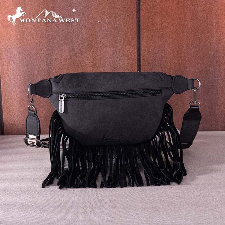 Made of synthetic leather Floral tooled on the front with a zippered pocket Top zipper closure Fringe detail A zippered pocket on the back Inside of the bag includes an open pocket Detachable and adjustable strap included（Strap: 16"-27"） 10.5"(L) x 4.5"(W) x 7"(H) Interior Capacity: Small Black Faux Leather Shoulder Bag With Pockets, Black Bag With Zipper Closure For Fall, Fall Black Shoulder Bag With Zipper Pocket, Black Satchel With Zipper Pocket For Fall, Black Shoulder Bag With Zipper Pocket For Fall, Casual Black Hobo Bag With Cell Phone Pocket, Black Hobo Bag With Zipper For Fall, Black Faux Leather Bag With Cell Phone Pocket, Black Faux Leather Bags With Cell Phone Pocket