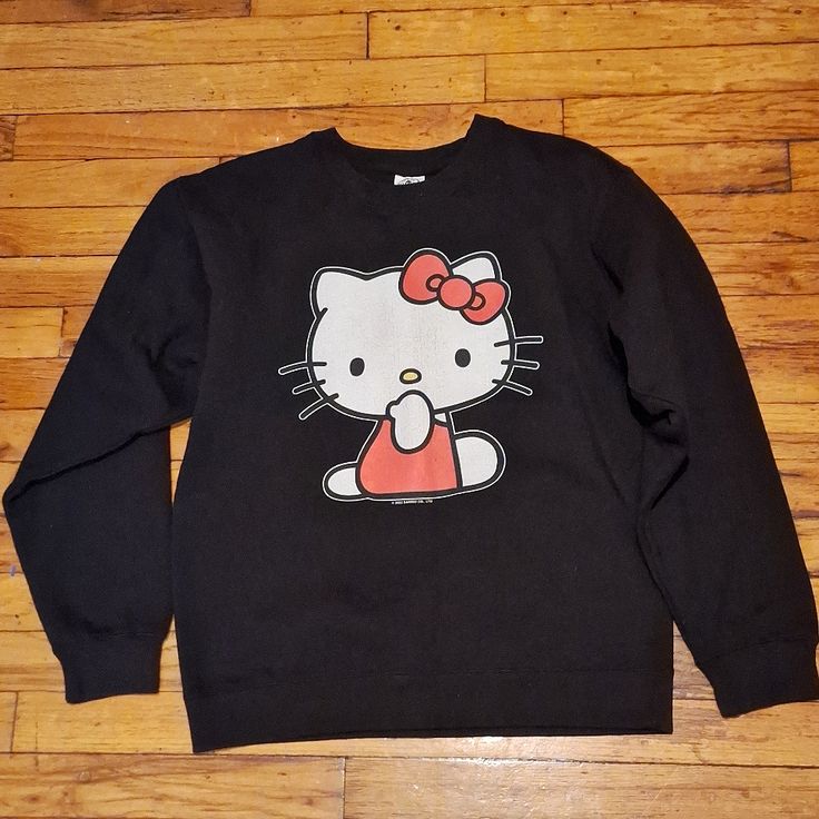 Sanrio Hello Kitty Thick Black Sweatshirt. Never Worn In Great Condition. Pet And Smoke-Free Home. Don't Be Afraid To Ask Any Questions Or Make An Offer. Hello Kitty Long Sleeve Cotton Top, Long Sleeve Cotton Hello Kitty Top, Casual Black Sweatshirt With Character Print, Hello Kitty Print Crew Neck Cotton Sweatshirt, Casual Hello Kitty Sweatshirt For Streetwear, Cotton Crew Neck Sweatshirt With Hello Kitty Print, Black Relaxed Fit Tops With Cat Design, Black Relaxed Fit Top With Cat Design, Casual Hello Kitty Print Crew Neck Sweatshirt