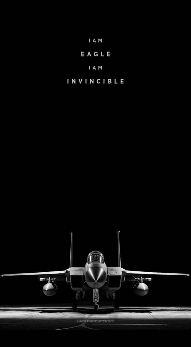 a black and white photo of an airplane with the words eagle i am invincible above it