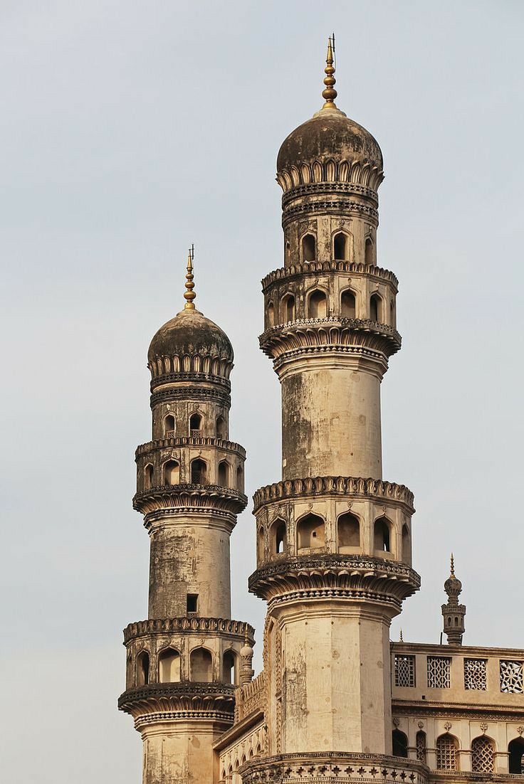 an old building with two towers on top