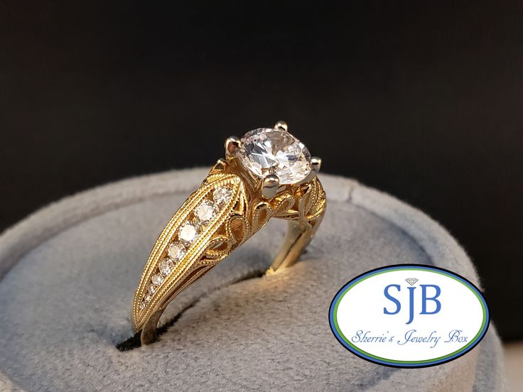 "💎Diamond💍Engagement Ring💎 Built in all 14k yellow gold, Featuring a beautiful vintage inspired design. Set with .33cts total weight of sparkling Genuine White Diamonds channel set down each side, with a center CZ place holder, ready to set your special Diamond or Gemstone (we can supply something special for you, please contact us for center stone pricing). This beautiful Vintage Design Engagement Ring 💍 is in stock and ready to ship. Also available in Rose Gold or White Gold by special ord Yellow Gold Rings With Intricate Round Cut Design, Yellow Gold Filigree Ring Stamped 14k For Wedding, Heirloom Solitaire Yellow Gold Wedding Ring, Classic Yellow Gold Filigree Wedding Ring, Heirloom Yellow Gold Solitaire Wedding Ring, Classic Yellow Gold Filigree Ring For Wedding, Elegant Yellow Gold Filigree Ring For Marriage, Classic Yellow Gold Rings With Intricate Design, Vintage Gold Engraved Ring With Center Stone