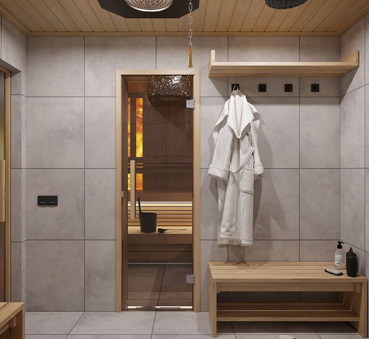 a bathroom with a sauna and wooden benches