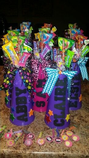 some candy and candies are sitting on a counter top with the words happy birthday written on them