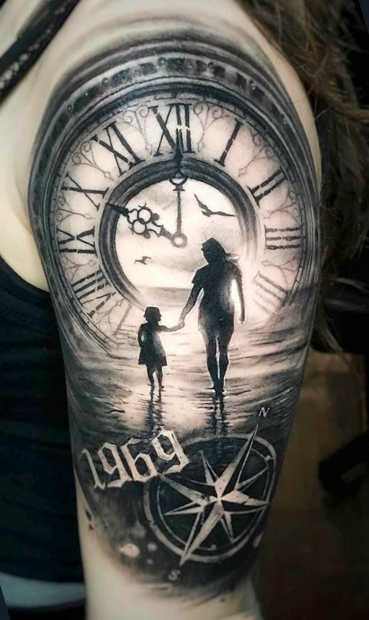 a woman with a tattoo on her arm holding the hand of a child in front of a clock