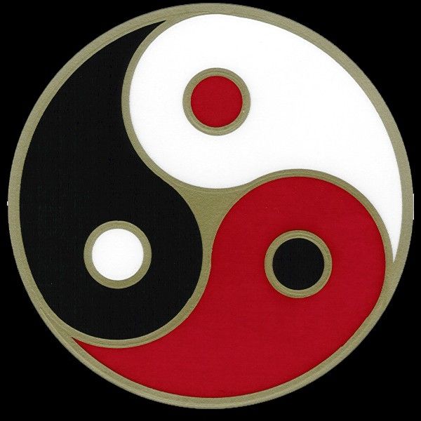 two black and red circles in the shape of a yin - yang symbol on a black background