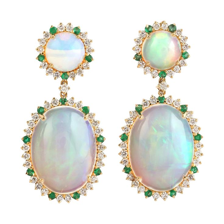 Cast in 14 karat gold. These earrings are hand set in 13.05 carats Ethiopian opal, .34 carats emerald, and .82 carats of sparkling diamonds. FOLLOW MEGHNA JEWELS storefront to view the latest collection & exclusive pieces. Meghna Jewels is proudly rated as a Top Seller on 1stDibs with 5 star customer reviews. All items manufactured by us are handmade and can be customized or redesigned. Composition Size-32X15 MM Total Weight-7.845 Gold Weight(Gms)-5.004 Diamond Wt(Cts)-0.82 Opal Wt(Cts)-13.05 Emerald Wt(Cts2)-0.34 Elegant Green Ethiopian Opal Jewelry, Formal Opal Gemstone Earrings, Oval Opal Earrings For Formal Occasions, Formal Oval Opal Earrings, Luxury Ethiopian Opal Formal Jewelry, Opal Jewelry Set, Vintage Drop Earrings, Top Seller, Love Ring