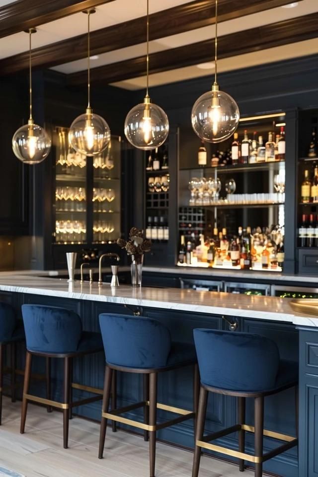 a bar with blue stools and hanging lights