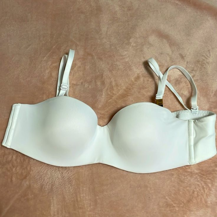 Pink Victoria’s Secret Strapless Bra. Brand New With Tags. Strapless Partially Lined Bra, White Bandeau Bra With Adjustable Straps, White Padded Bandeau Bra, Strapless Bra, Victoria’s Secret, Women's Intimates, Victoria Secret Pink, Pink Ladies, Victoria's Secret