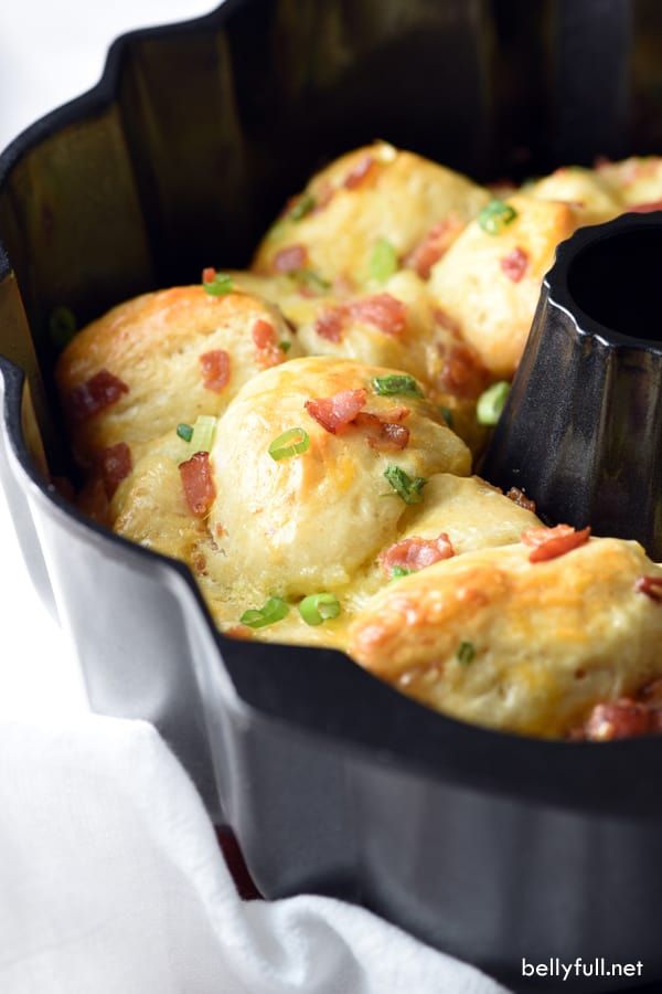 a casserole dish with ham and cheese in it, ready to be eaten