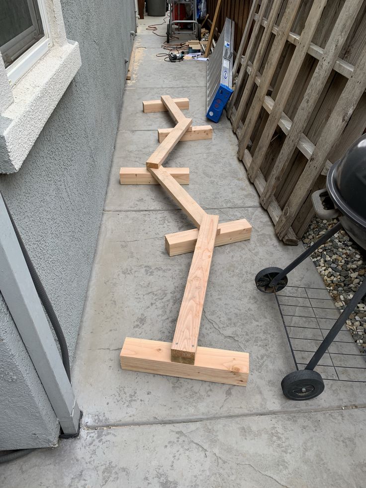 several pieces of wood laying on the ground