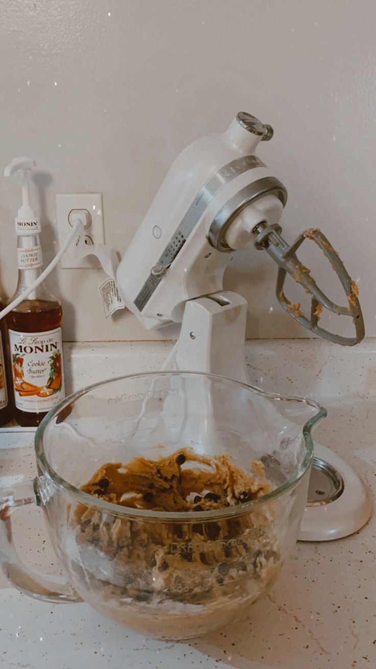 a bowl of cookie dough in front of a  white kitchenaid stand mixer. Counters are white and gold marble with coffee syrups in the back Baking Aesthetic Kitchenaid, Kitchenaid Mixer Aesthetic, Kitchenaid Aesthetic, Baking Chocolate Chip Cookies, Insta Stories Ideas, Vision Board Pics, Baking Chocolate, Twenty Twenty, Baking Cookies