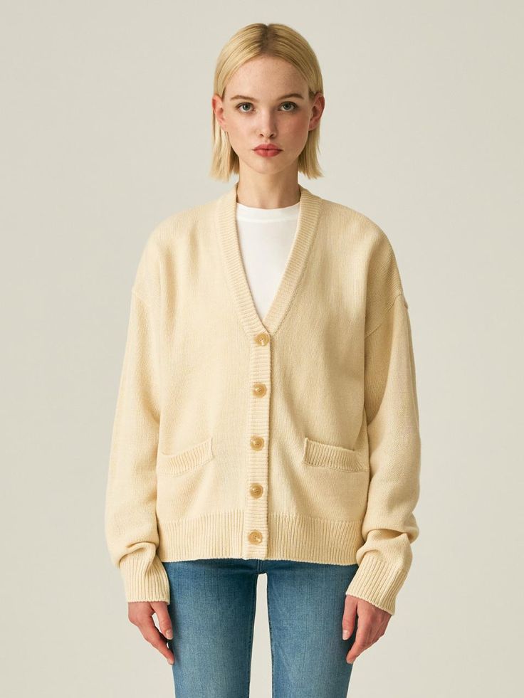 Composition : ACRYLIC 70%, WOOL 30%Color : Yellow BeigeCountry of Origin : Republic of Korea Cream Wool V-neck Outerwear, Classic Cream Merino Wool Cardigan, Classic Cream Cardigan With Relaxed Fit, Casual Beige Merino Wool Cardigan, Yellow Wool Sweater For Fall, Oversized Classic Cream Cardigan, Classic Oversized Cream Cardigan, Cream Wool Cardigan For Fall, Casual Yellow Wool Sweater