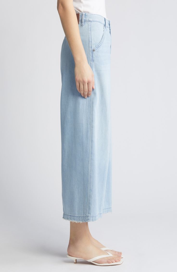 Raw-edged hems lend a rugged touch to these high-waist jeans cut in a wide-leg silhouette from stretch denim. 26" inseam Zip fly with button closure Front slant pockets 73% cotton, 27% rayon Machine wash, tumble dry Imported Casual Wide Leg Bottoms With Unfinished Hem, High Waist Rigid Denim Bottoms With Frayed Hem, Casual High Rise Wide Leg Pants With Frayed Hem, Wide Leg Denim Pants With Frayed Hem, High Rise Bottoms With Unfinished Hem For Spring, High Rise Cotton Wide Leg Pants With Frayed Hem, Denim Blue Wide Leg Pants With Frayed Hem, Casual High Rise Jeans With Unfinished Hem, Wide Leg Denim Blue Pants With Frayed Hem