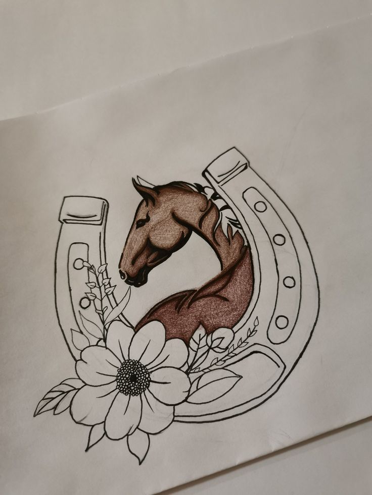 a drawing of a horse in a horseshoe with flowers on the side and a flower inside