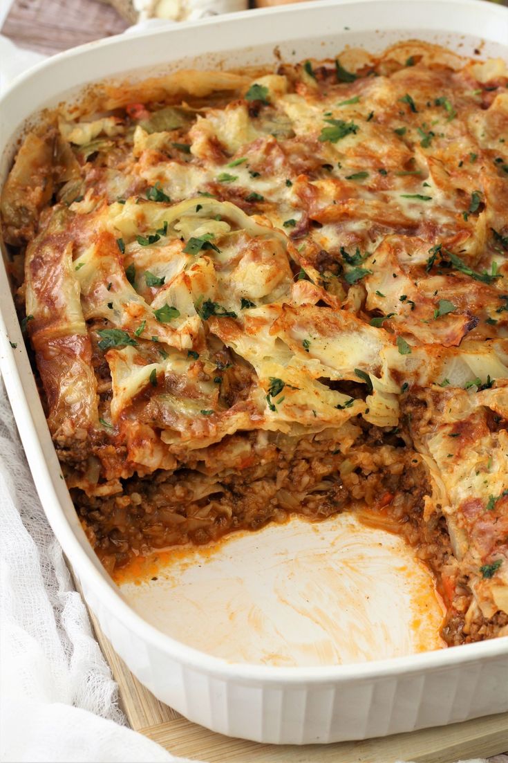 a casserole dish filled with meat and vegetables