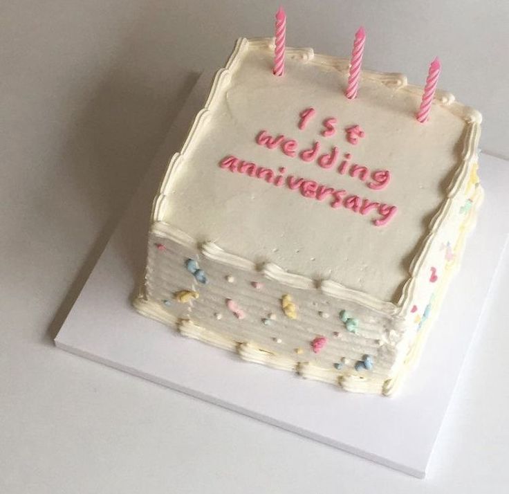 a birthday cake with candles on it that says 13th wedding anniversary