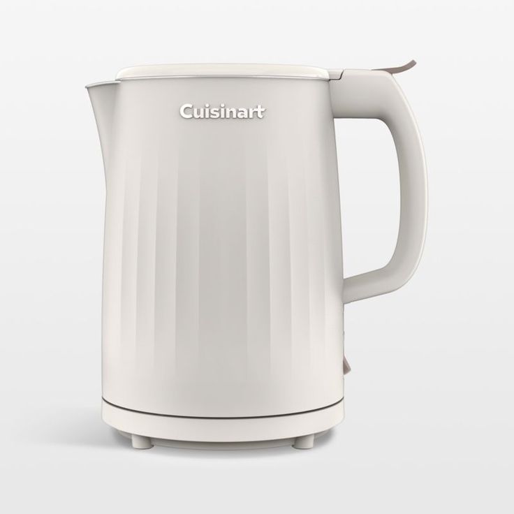 a white electric kettle with the words cuisineart on it's front and side