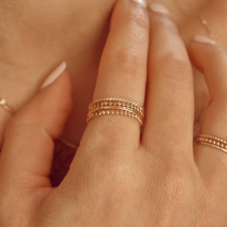 Elevate your style with our handcrafted 14k gold-filled stacking ring. Each ring is meticulously crafted, ensuring that every piece carries the artistry of handmade excellence. The result? A one-of-a-kind ring, as unique as you. This can be your everyday ring. Handcrafted in USA Sold by one ring DETAILS: Hypoallergenic, Water Resistant Material: 14/20 Gold filled Dimensions: Width 1.4mm Note: As each piece is totally handcrafted dimensions and shapes can slightly vary ensuring no two are exactly Heirloom Stackable Rings, Tarnish Resistant, Everyday Heirloom Style Tarnish Resistant Stackable Rings, Dainty Adjustable Stackable Toe Rings, Delicate 14k Gold Band, Heirloom Style Everyday Stackable Rings In Recycled Gold, 14k Gold Filled Ring Jewelry For Anniversary, 14k Gold Filled Jewelry For Anniversary, 14k Gold-filled Ring Jewelry For Anniversary, 14k Gold Filled Ring For Anniversary