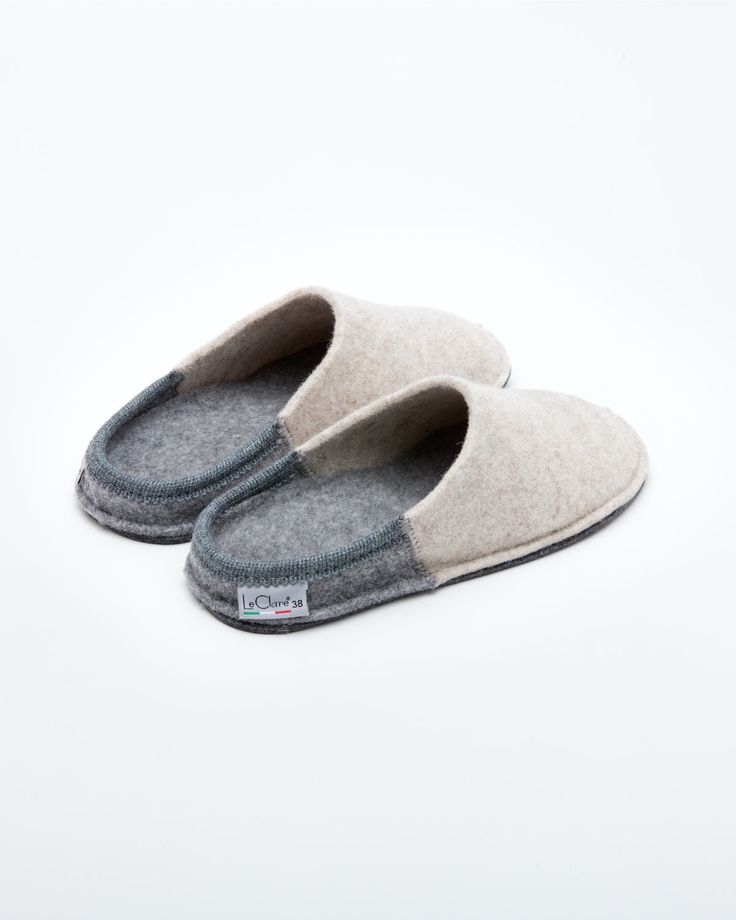 Description: The Nuvola Bico in beige and grey is our soft clog slipper, fully crafted in wool with a 1.5 cm interior heel height EVA insole for added comfort. The Nuvola retains the look of a slipper with the cushioned feel of a sneaker. Designed for the perfect amount of support and feather lightweight, Nuvola feels almost like walking on a cloud. Details: 100% Wool felt upper Two tone design: Colored front with light grey rear and insole Removable 1.5 cm interior heel height EVA insole - for Beige Slip-on Comfortable Clogs, Beige Slip-on Comfortable Slippers, Beige Comfortable Slip-on Clogs, Comfortable Beige Slip-on Clogs, Comfortable Gray Slippers With Textured Footbed, Wool Slippers With Cushioned Footbed And Round Toe, Beige Cushioned Slippers For Indoor Use, Wool Slippers With Rubber Sole And Round Toe, Comfortable Wool Closed Toe Clogs