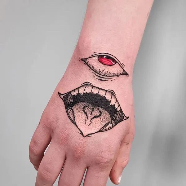 a person's hand with a tattoo on it and an image of a woman's face