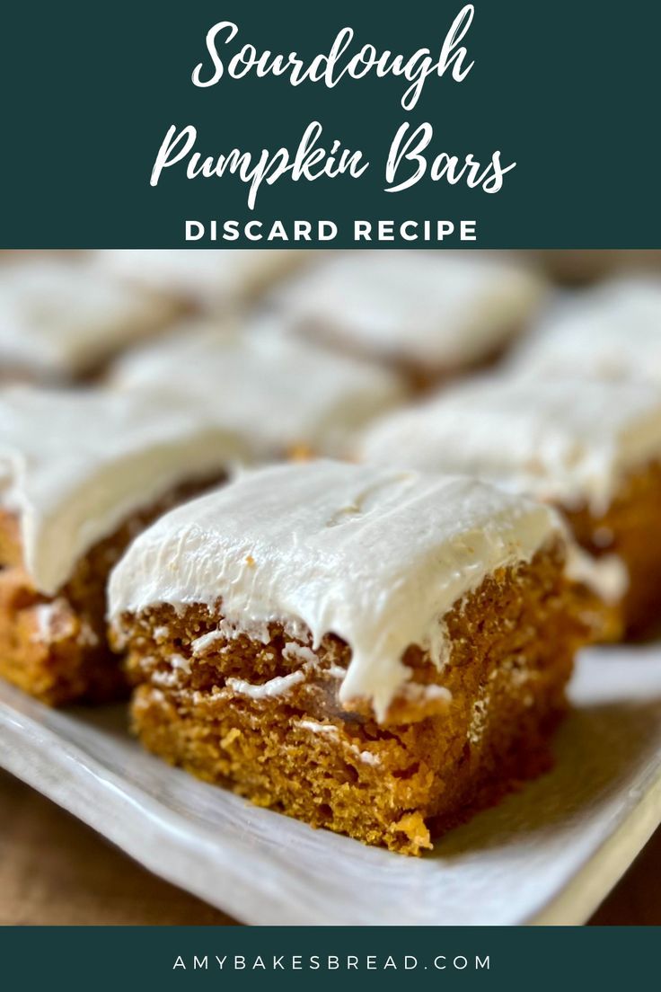 pumpkin bars with white frosting are on a plate and the title says, sourdough pumpkin bars