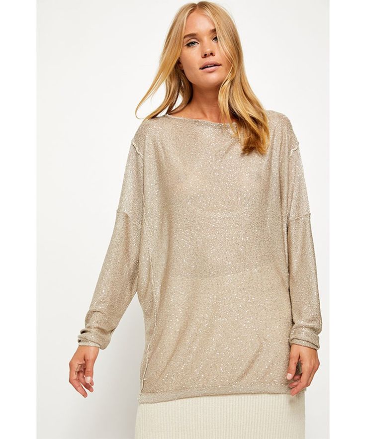 Gorgeous drapey pullover sweater designed in a shimmery semi-sheer metallic fabrication with super low scoop back. Care/Import Hand Wash Cold Measurements for size small Bust (Extended): 54 in Length: 28.75 in Sleeve Length: 17 in Contents: 100% Polyester Chic Long Sleeve Glitter Tops, Shimmer Long Sleeve Tops For Spring, Long Sleeve Shimmer Top For Spring, Glitter Champagne, Back Care, All That Glitters, Christmas Tees, Sweater Design, Pj Sets