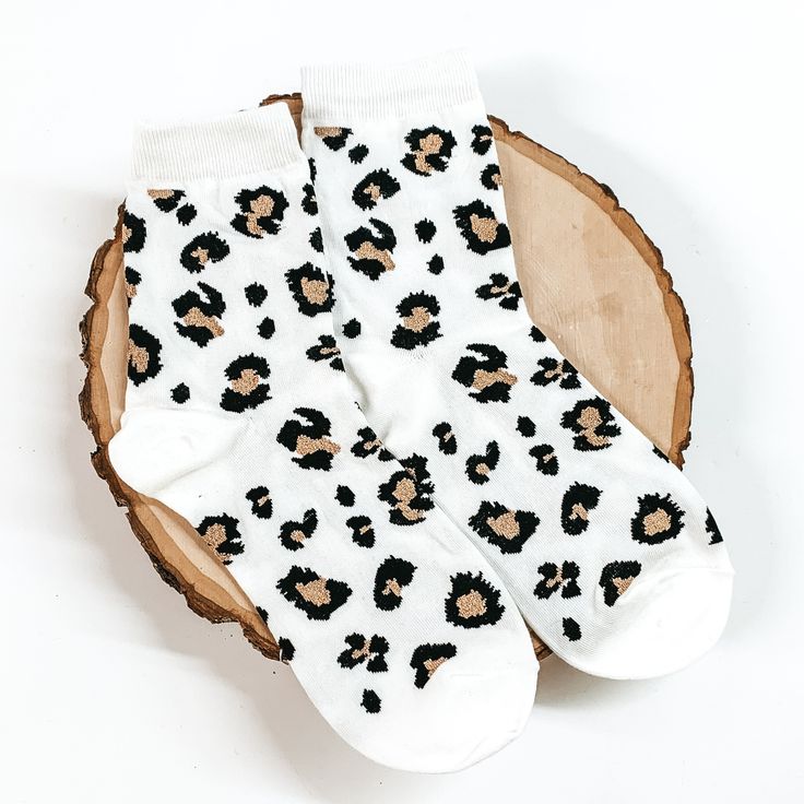 White ankle socks with a black and champagne leopard print design. These socks are pictured on a piece of wood on a white background. Casual One Size Socks For Stocking Stuffer, White Ankle Socks, Cute Stockings, Giddy Up Glamour, Black Leopard Print, Boho Bedroom Decor, Black Leopard, Boho Bedroom, Christmas Wishlist