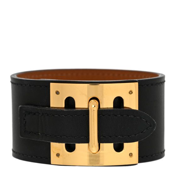 This is an authentic HERMES Box Intense Bracelet size M in Black. This stunning cuff bracelet is crafted of Box calfskin leather in black, and features a polished gold closure plaque. Elegant Leather Bracelet With Gold-tone Hardware, Elegant Leather Bracelet With Gold-tone Hardware For Formal Occasions, Luxury Leather Bracelet With Gold-tone Hardware, Luxury Leather Bracelet With Gold-tone Hardware For Formal Events, Luxury Leather Bracelet With Gold-tone Hardware For Formal Occasions, Elegant Leather Bracelets With Gold Clasp, Modern Gold Leather Bracelet With Gold-tone Hardware, Formal Gold Leather Bracelet With Gold-tone Hardware, Elegant Leather Bracelets With Gold-tone Hardware