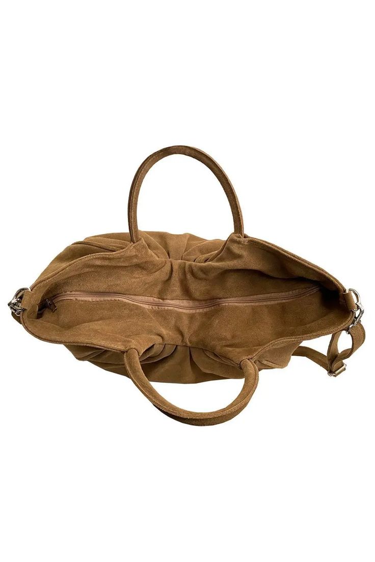 Extra large gathered suede satchel. Comes with a removable and adjustable crossbody strap. Full top zippered closure. Inside has a back zipper pocket and a slide phone pocket. (L x W x H) 17 in x 5 in x 13 in. Luxury Suede Shoulder Bag With Zipper Closure, Luxury Suede Bag With Zipper Closure, Suede Top Handle Satchel For Travel, Suede Tote Bag With Detachable Strap, Top Handle Suede Satchel For Travel, Daily Use Suede Shoulder Bag With Detachable Handle, Suede Satchel With Detachable Strap, Suede Satchel With Detachable Handle, Suede Shoulder Bag With Detachable Strap For Daily Use