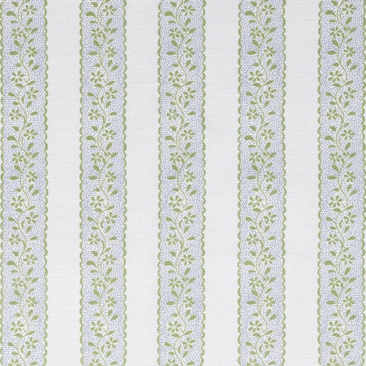 a white and green striped wallpaper with small leaves on the border, in an ornate pattern