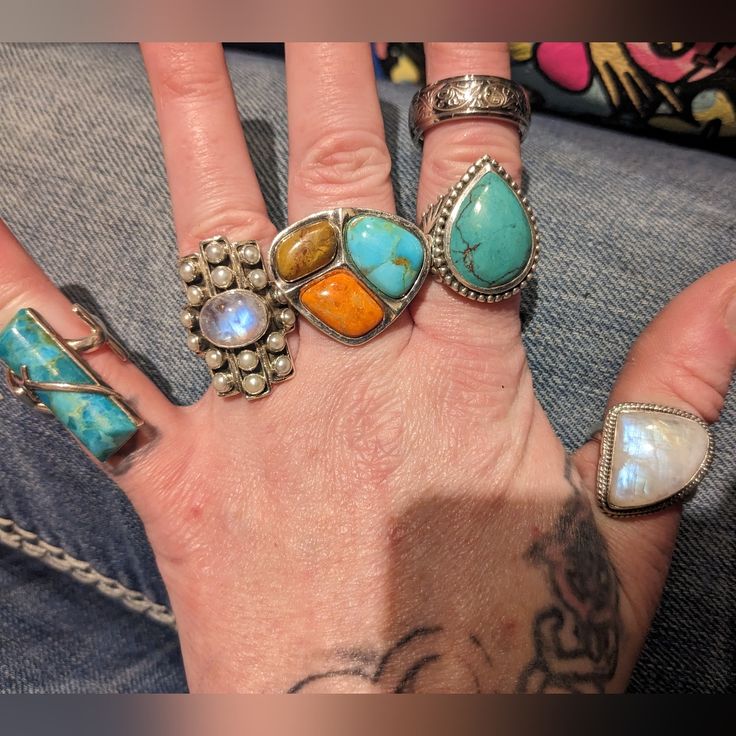 I Have 10 Antique Solid 925 Sterling And Turquoise Rings, If You Would Like Them All, Or Just A Couple Or Just One Let Me Know They All Have Theyr Boxes And The Stones Are Real, Except The Thick One With The Red Stones In The Flowers I'm Not Sure About That One, There Is The One Moonstone, Also I Have Sets Of Rings Earrings Necklaces And Bracelets... , I Have Tons Of Turquoise And 935 Sterling Jewelry Bracelets Necklaces Earrings None Are Plated. If You Would Like To Look At Other Items Message Me On Here. Smoke And Pet Free Home Make An Offer Only If Its Realistic And Reasonable, Please Dont Sent Rediculous Low Ball Offes You Will Be Ignored. Unique Turquoise Gemstone Ring, Artisan Sterling Silver Open Ring Jewelry, Round Turquoise Ring With Gemstone Accents, Bohemian Sterling Silver Gemstones, Artisan Open Turquoise Ring, Turquoise Jewelry Stamped 925, Bohemian Turquoise Gemstones In Sterling Silver, Southwestern Sterling Silver Gemstone Jewelry, Sterling Silver Turquoise Ring With Gemstone Accents