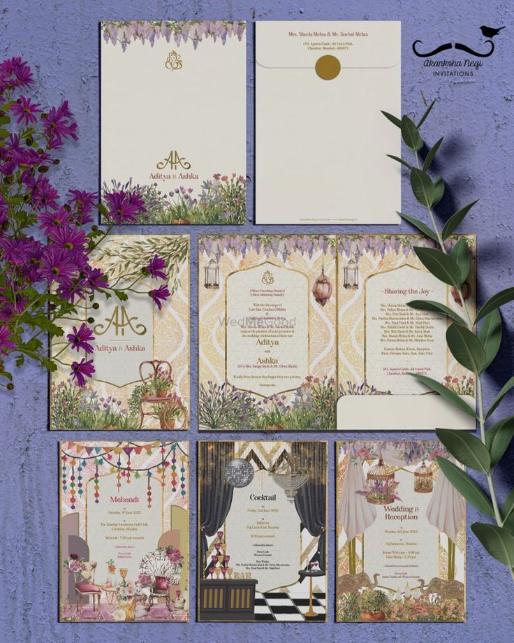 the wedding stationery is laid out next to some purple flowers and greenery on a blue background