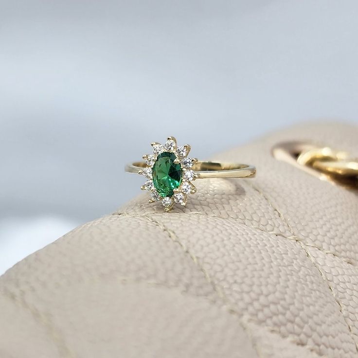 Vintage Design 14k Gold Ring with 1.05 Carat Emerald Green Stone and 0.30 Carat Diamond Mounted Stone ✔ You can order this ring , in three color gold options. Gold , rose gold , white gold. ✔ Rings come in a gift box.You can make it gift with this box. ✔ You can add a gift note. ✔ Our other rings : ✔ https://www.etsy.com/shop/FasekkGold?section_id=42123317 Cluster Gemstone Ring For May Birthstone, Emerald Cluster Ring With Halo Setting For Wedding, Formal Diamond Ring With Halo For May Birthstone, Wedding Emerald Ring With Halo, Wedding Emerald Halo Ring, May Birthstone Diamond Ring With Halo Design, Wedding Halo Ring With May Birthstone In Round Cut, Emerald Wedding Ring With Halo Design, May Birthstone Halo Ring For Wedding