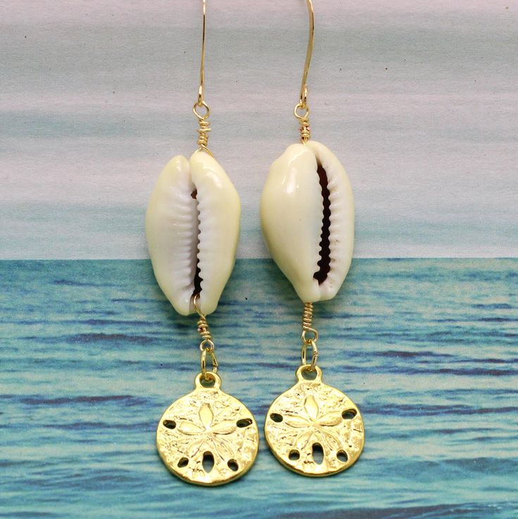 Handmade Cowrie Shell Earrings For Beach, Cowrie Shell Earrings For Beach, Beach Cowrie Shell-shaped Earrings, Cowrie Shell Beach Earrings, Beach Shell Earrings Made Of Cowrie, Beach-style Cowrie Shell Earrings, Bohemian Adjustable Cowrie Shell Earrings, Bohemian Shell-shaped Earrings For Vacation, Bohemian Shell Jewelry For Pierced Ears