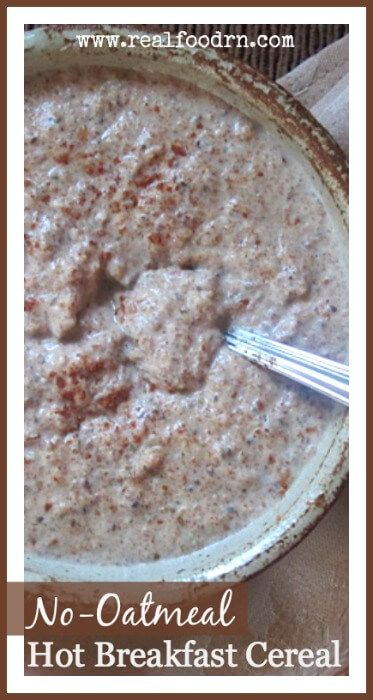 a bowl filled with oatmeal sitting on top of a table